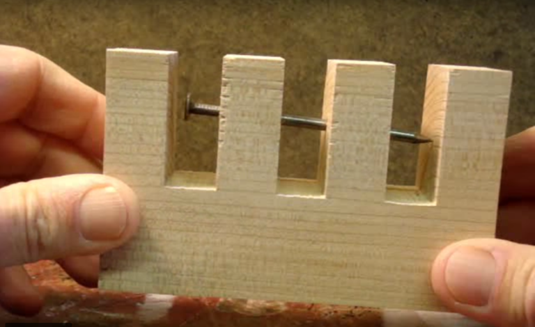 [VIDEO] Impossible Nail-Through-the-Wood Puzzle Solved